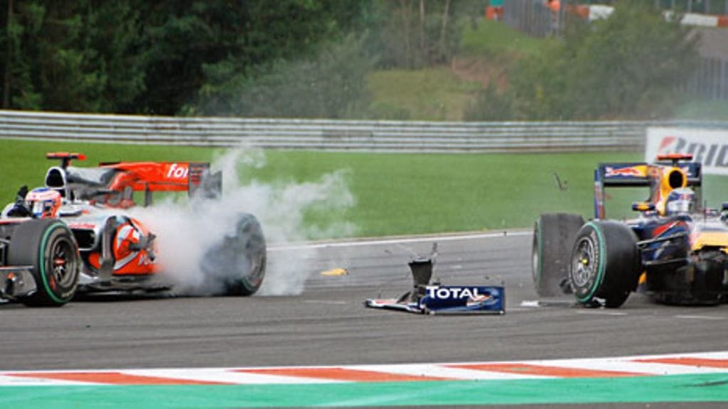 Jenson Button, Sebastian Vettel, kuva: EPA/LUIS ARRENDONDAS