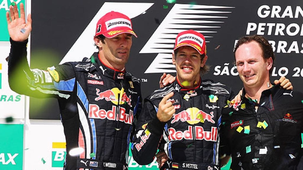 Mark Webber, Sebastian Vettel ja Christian Horner Brasilian GP:n palkintopallilla