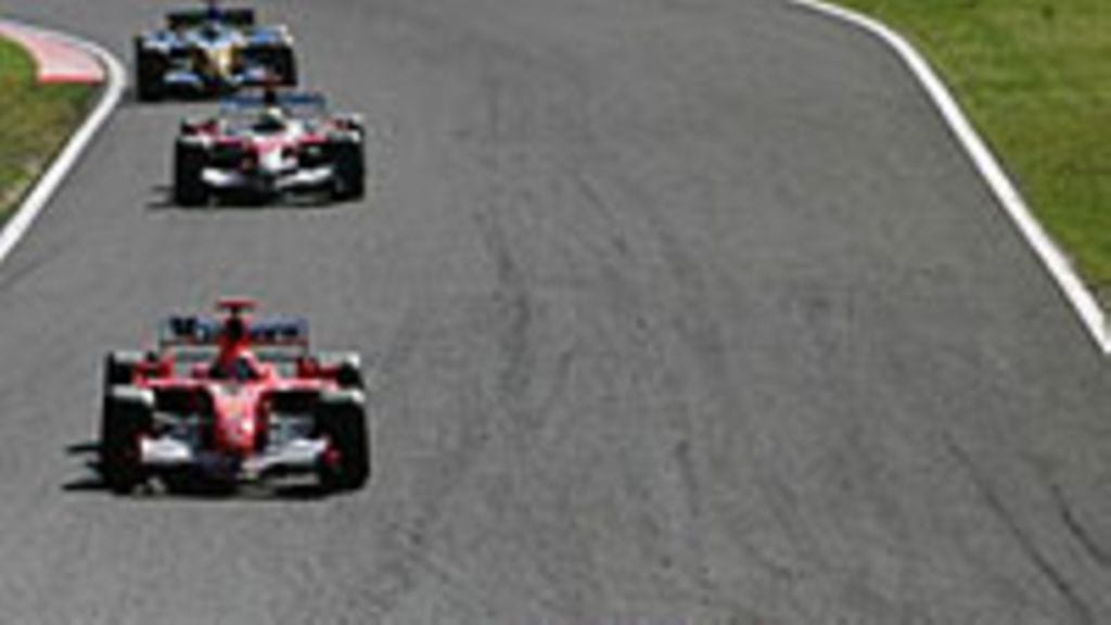 Felipe Massa ja Michael Schumacher, kuva: Paul Gilham