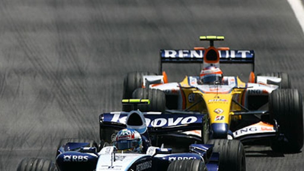 Alexander Wurz ja Heikki Kovalainen, kuva: Paul Gilham