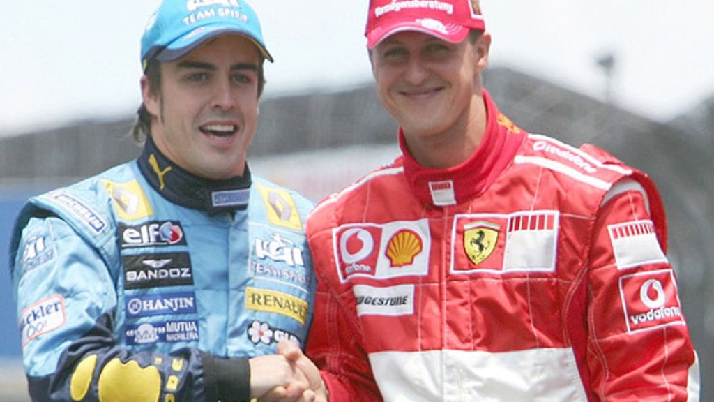 Michael Schumacher ja Fernando Alonso paiskasivat kättä ennen vuoden 2006 päätöskisaa Brasiliassa.