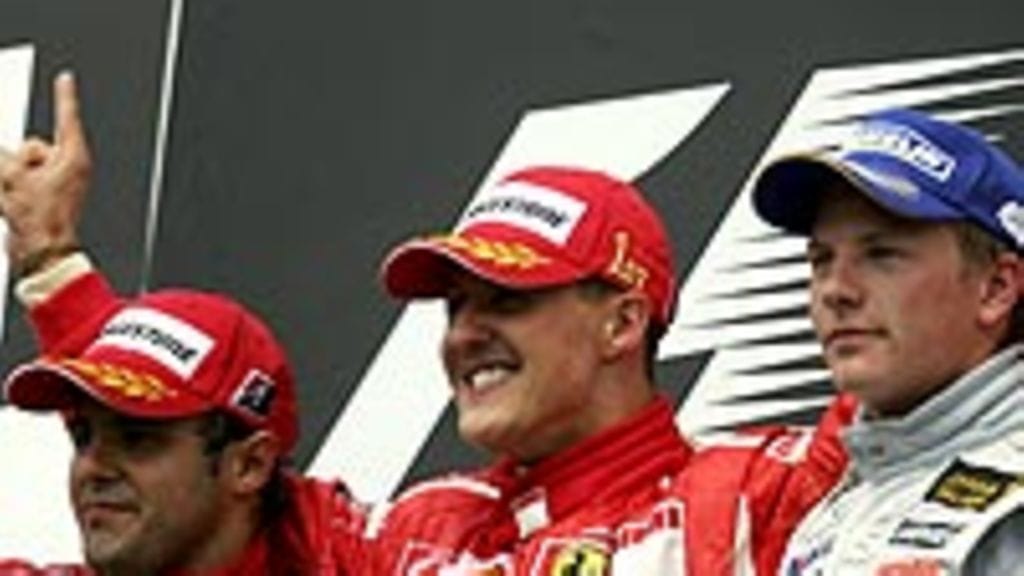 Felipe Massa, Michael Schumacher ja Kimi Räikkönen (Kuva: Clive Rose/Getty Images)