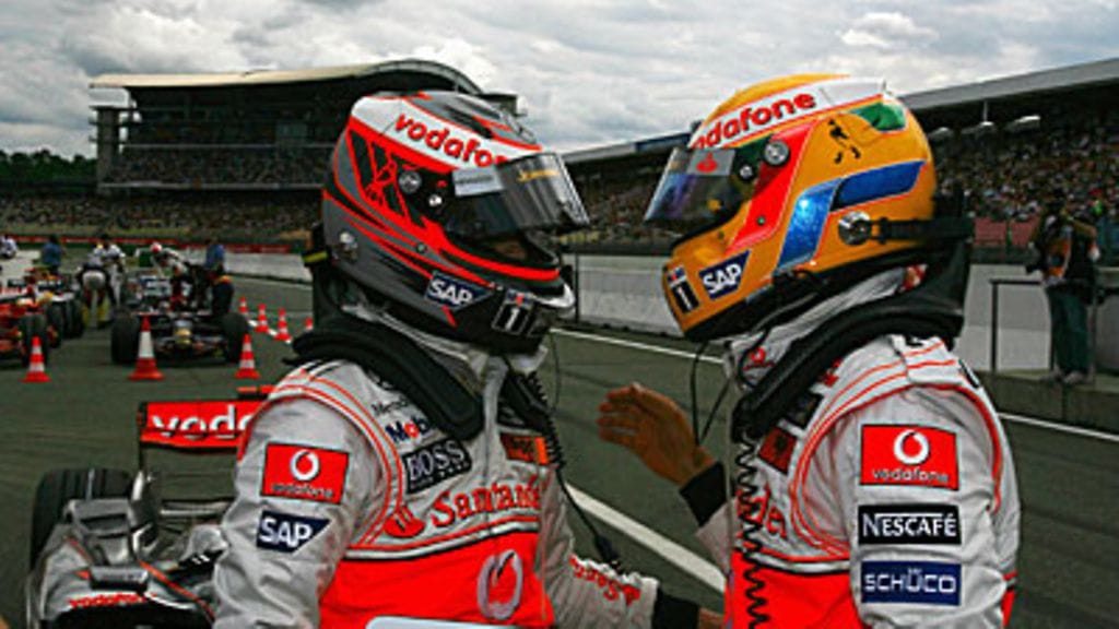 Heikki Kovalainen ja Lewis Hamilton, kuva: Paul Gilham/Getty Images