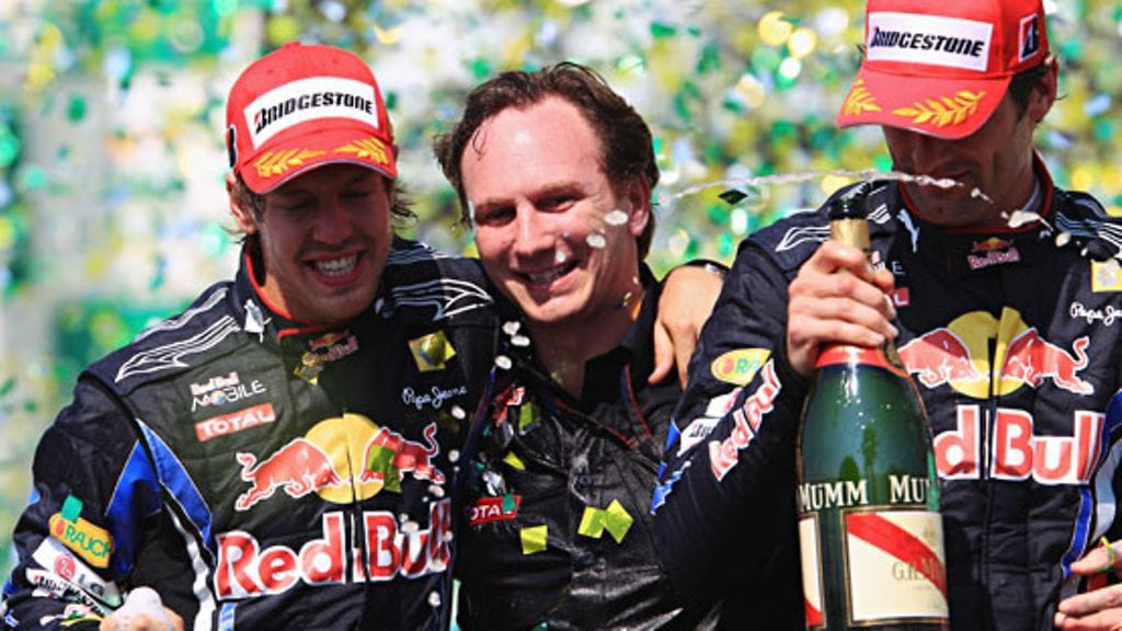 Tallipäällikkö Christian Horner ja kuskikaksikko Vettel & Webber