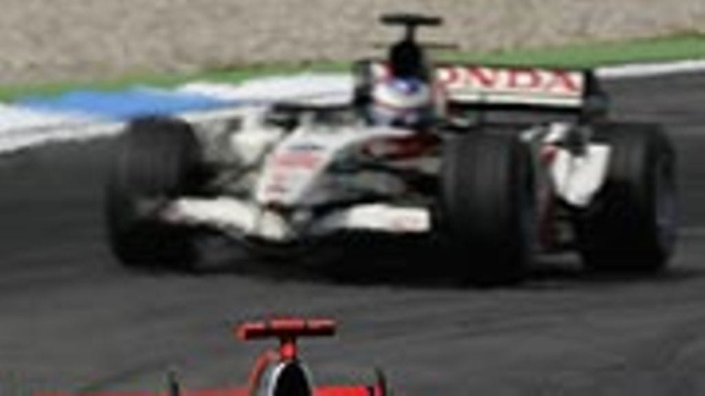 Kimi Räikkönen ja Jenson Button (Kuva: Clive Rose/Getty Images)