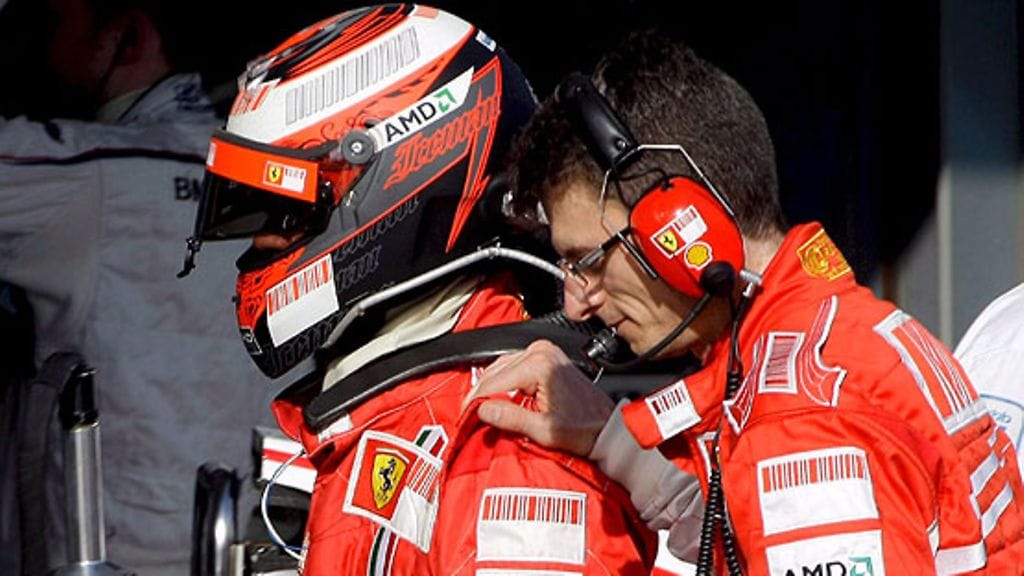 Kimi Räikkönen ja Chris Dyer, kuva: EPA/Oliver Multhaup