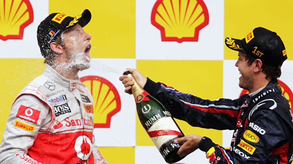 Jenson Button ja Sebastian Vettel