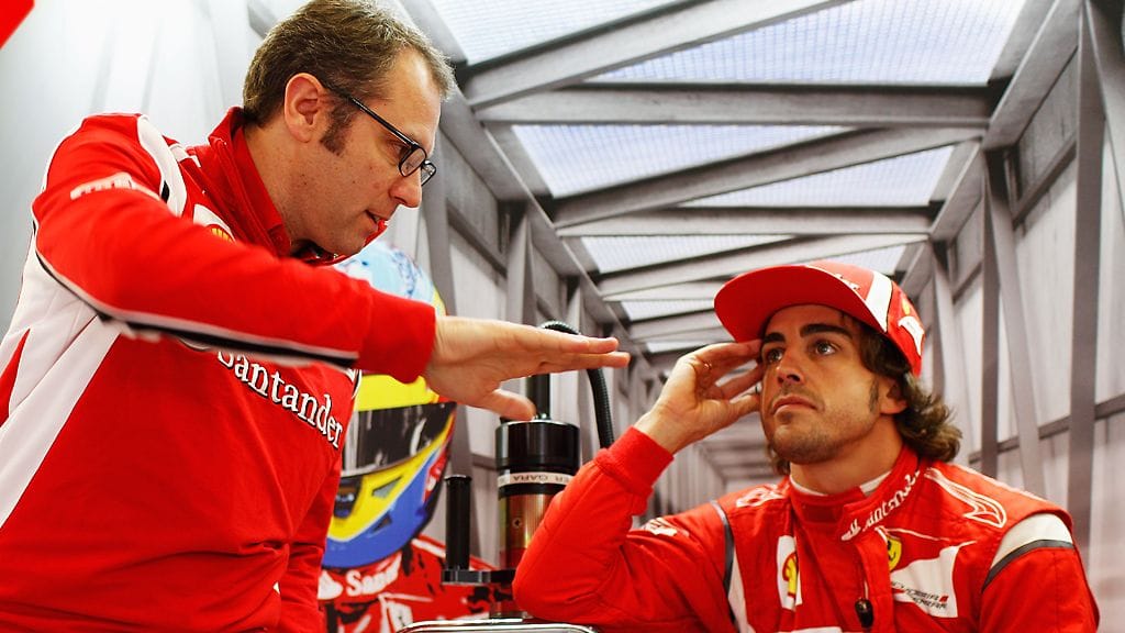 Ferrarin tallipäällikkö Stefano Domenicali ja kuljettaja Fernando Alonso