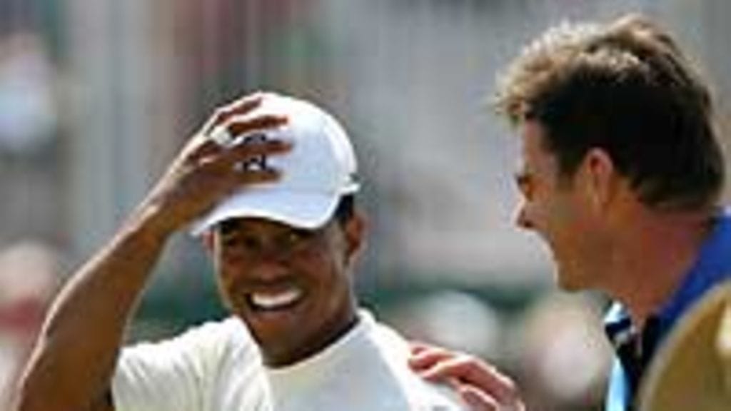 Tiger Woods ja Nick Faldo, kuva: Ross Kinnaird/Getty Images