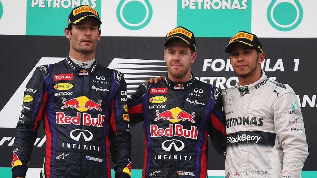 Malesian kärkikolmikko: Mark Webber, Sebastian Vettel, Lewis Hamilton