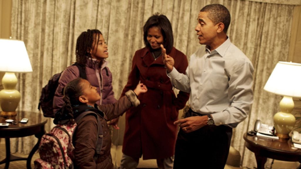 Sasha, Malia, Michelle ja Barack Obama (EPA)