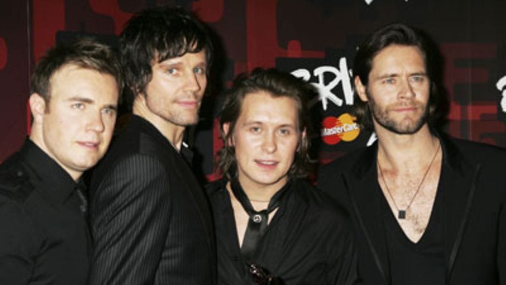 Gary Barlow (vas.) yhdessä bändkavereidensa kanssa (Kuva: Chris Jackson/ Getty Images)