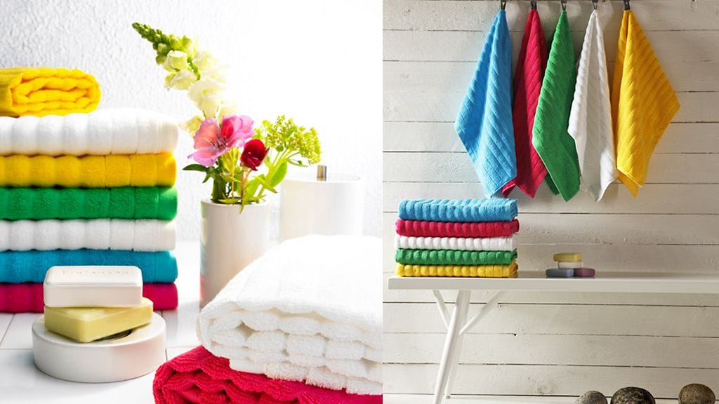 Luonnosta poimitut koristeet ja värikkäät tekstiilit viimeistelevät juhannussaunan. Kuva: Finlayson