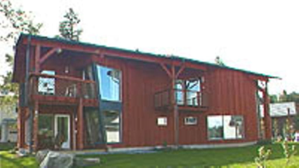 "Kaksi Tapaa" kaksikerrokseinen puutalo