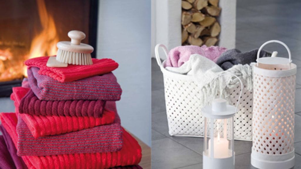 Luhdan lyhdyt ja pyyhkeet tuovat jouluista ilmettä saunaan.