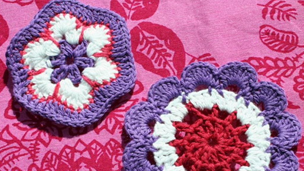 Japanilainen ja afrikkalainen neulekukka.