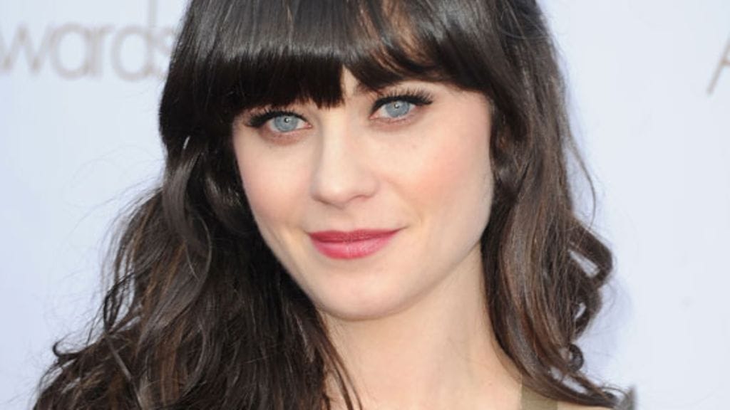 Zooey Deschanel (oik.) kertoo siskonsa Emilyn (vas.) olevan hyvin äidillinen.