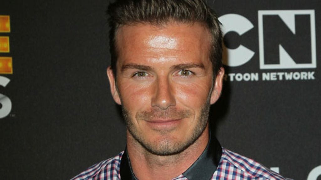 Beckhamit vuonna 1999 Versacen suunnittelemissa nahka-asuissa.