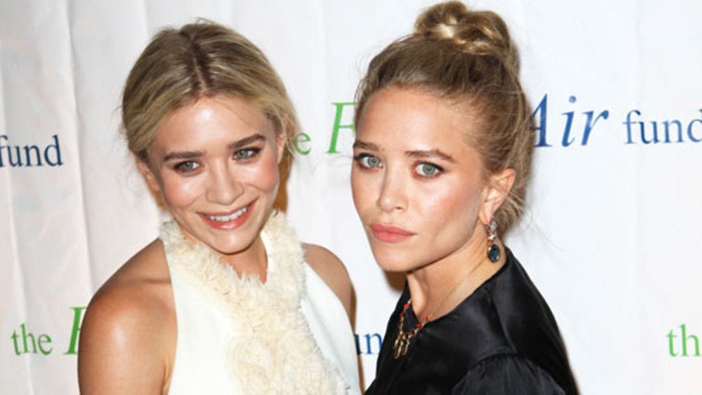 Olsenin siskokset edustivat mustassa ja valkoisessa.