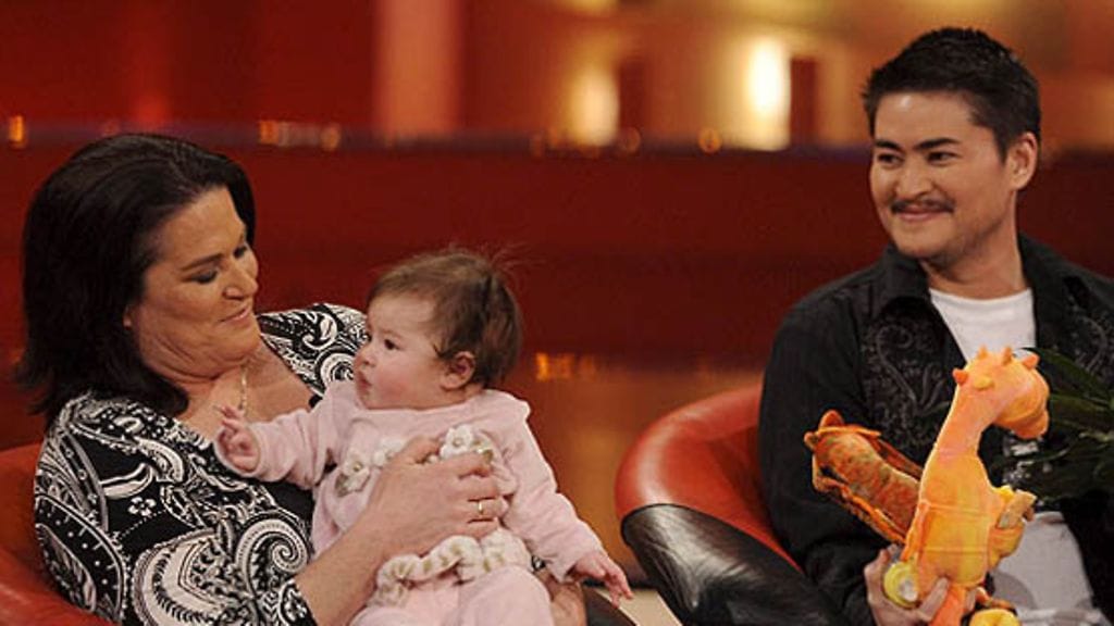 Thomas Beatie ja hänen vaimonsa Nancy sekä esikoistytär Susan Juliette. Kuva: EPA