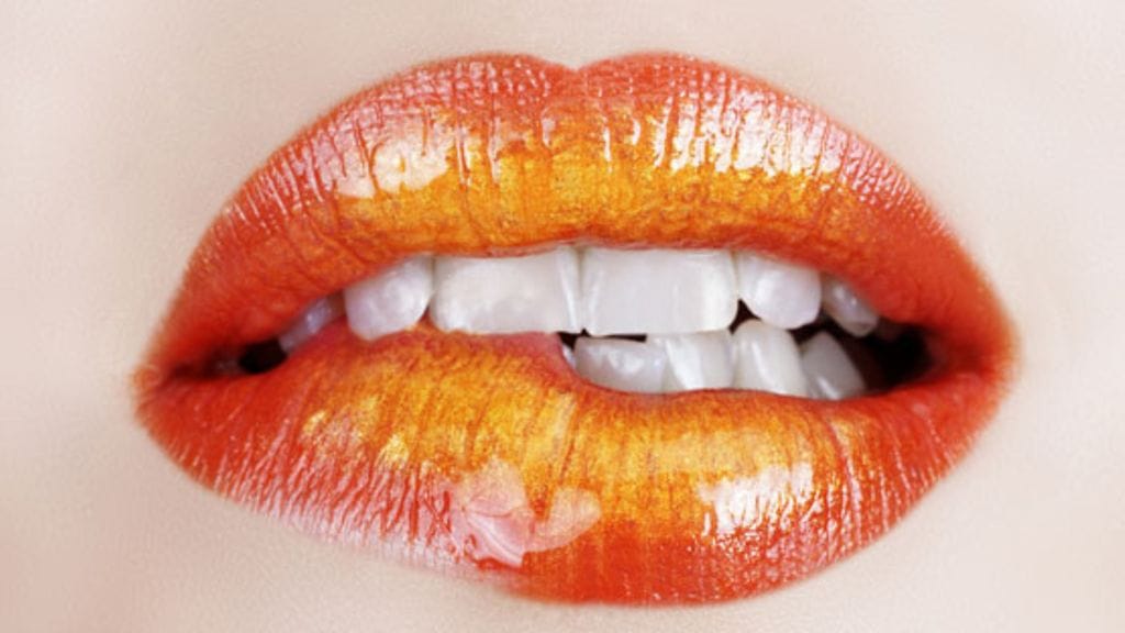 Mad Men -näyttelijä Christina Hendricks luottaa kirkkaaseen punaan.