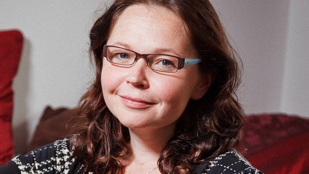 Fahmin perhe: isä Mina sylissään pieni Luca-poika, vieressä Sanna-äiti.