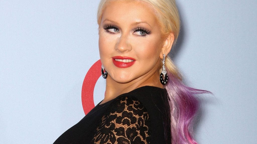 Christina Aguilera keräsi katseet pitsimekossa.
