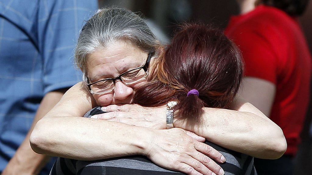 Nancy Ruiz (facing), mother of Gina DeJesus, celebrates with friends and family in the yard at Gina DeJesus' home in Cleveland, Ohio, USA, 08 May 2013, following Gina's homecoming.