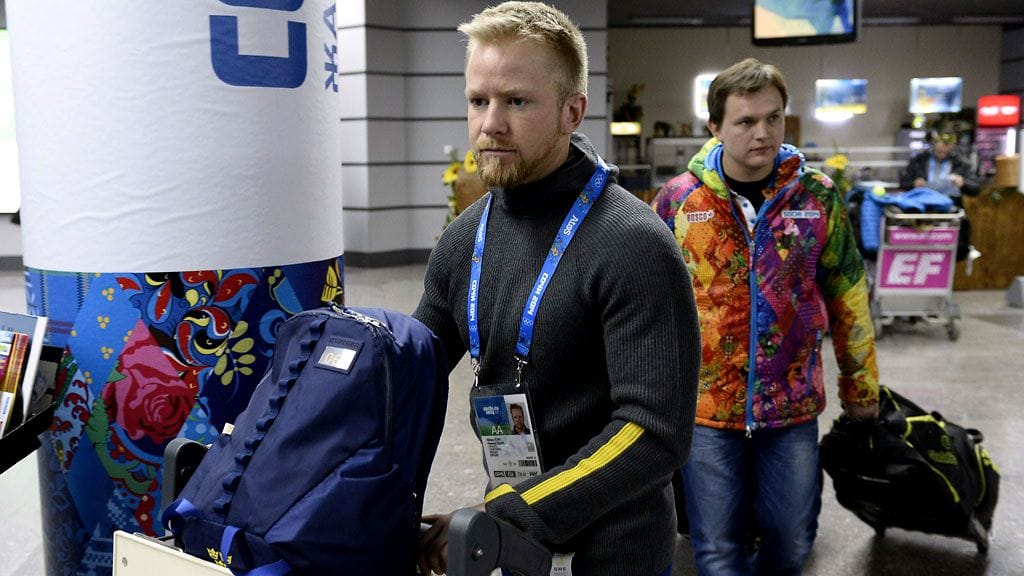 Ruotsin curling-joukkue matkalla Sotshiin.