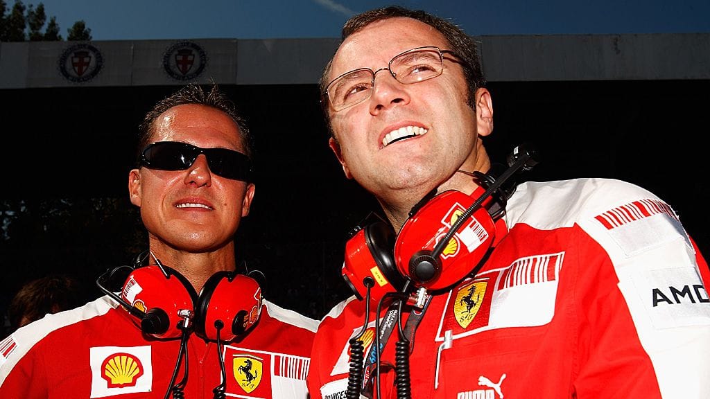 Michael Schumacher (vas.) ja Stefano Domenicali