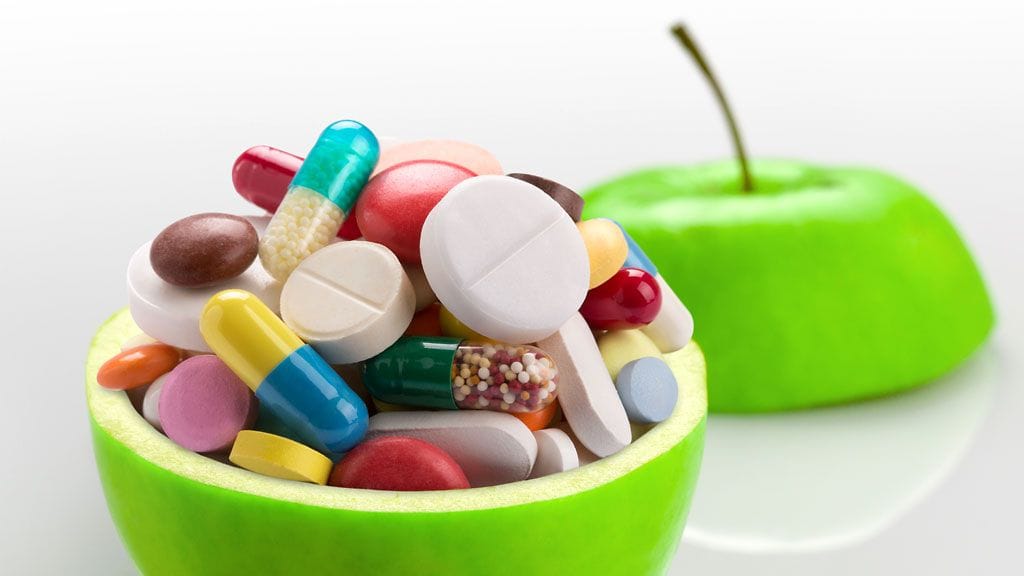 Omena päivässä pitää lääkärin loitolla – vai voisiko vitamiinit popsia pillereiden muodossa?