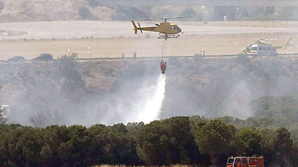 Espanjalaiskone suistui kiitoradalta Madridissa 20.8.2008 (Kuva: EPA)