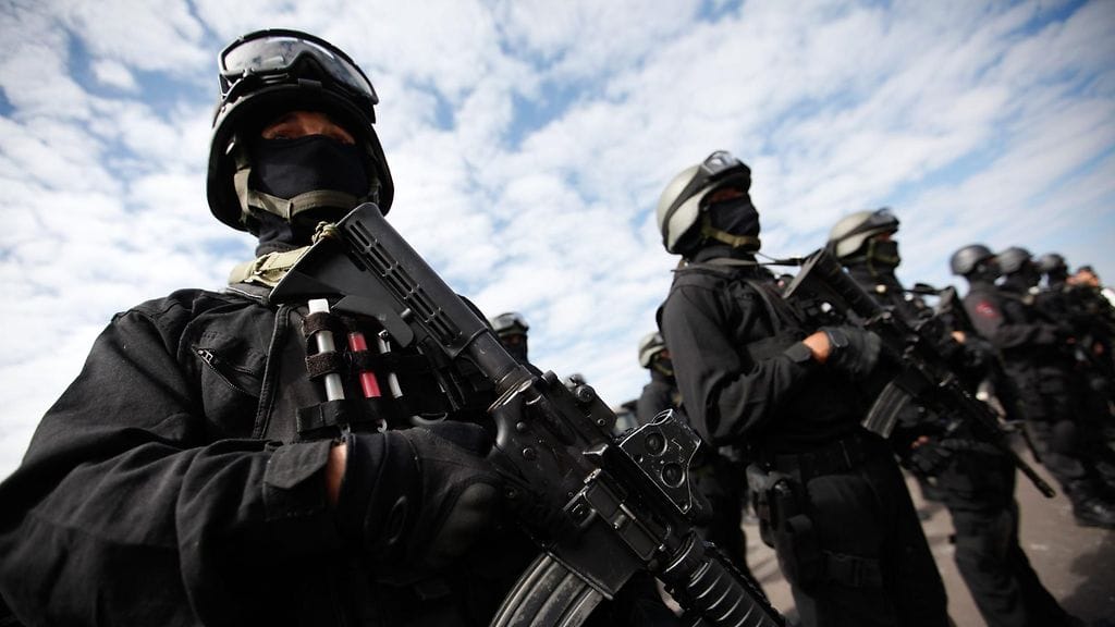 Tässä ei valmistauduta taisteluun, vaan jalkapallon MM-kisoihin. Brasilian armeija esitteli kisojen turvatoimista vastaavia joukkojaan 8. kesäkuuta 2014.