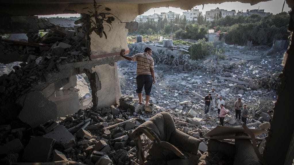 Gaza City  8.8.2014. Israel tulitti raskaasti Gazaa vuonna 2014 . Iskut jättivät 100 000 ihmistä kodittomaksi ja yli 2 200 ihmistä kuoli.