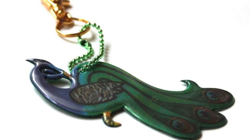 Riikinkukko -koruheijastin_heijastinkauppa.fi