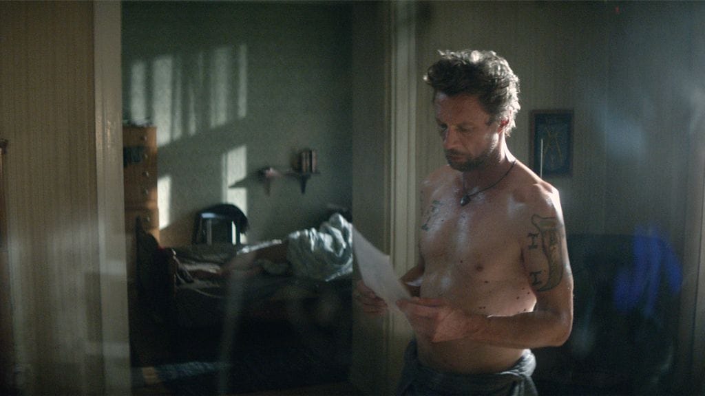 Antti Reini Jussi Vareksen roolissa elokuvassa Vares – Sheriffi 3