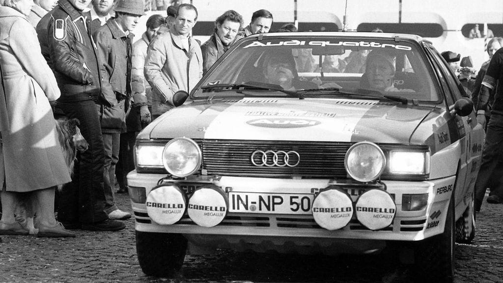 Hannu Mikkola ja Arne Hertz Audi Quattrossa vuoden 1981 Monte Carlo -rallissa. Kyseessä ei ole sama auto, joka myydään huutokaupassa.