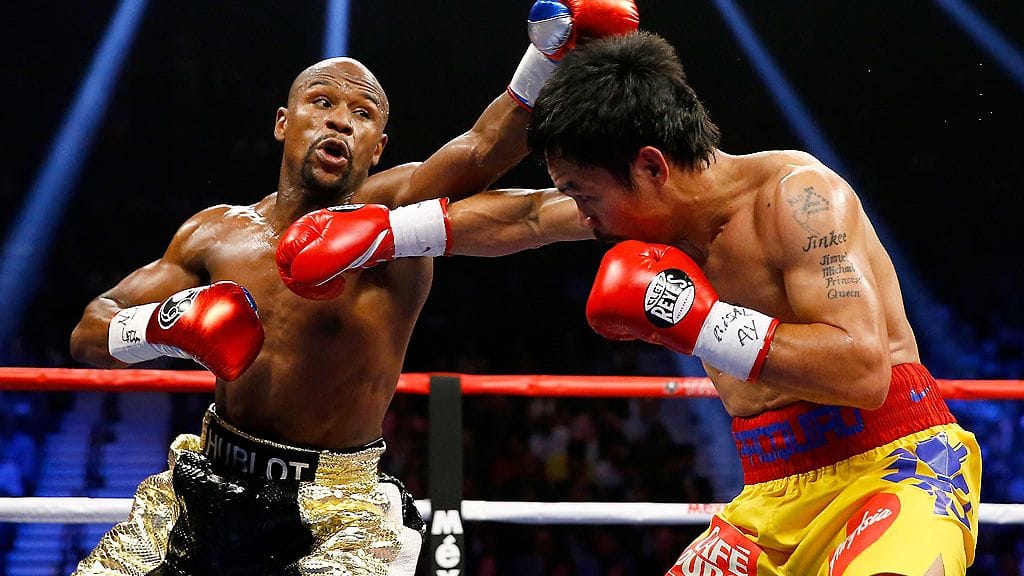 Floyd Mayweather ja Manny Pacquiao kehässä viime toukokuussa.