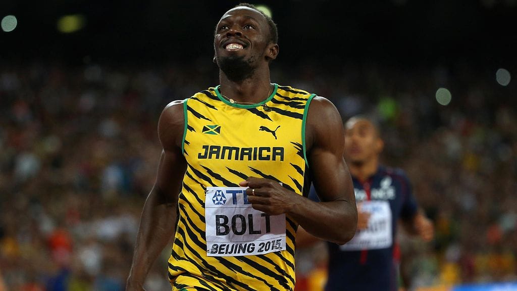 Usain Bolt riemuitsi 100 metrin voitosta MM-Pekingissä.