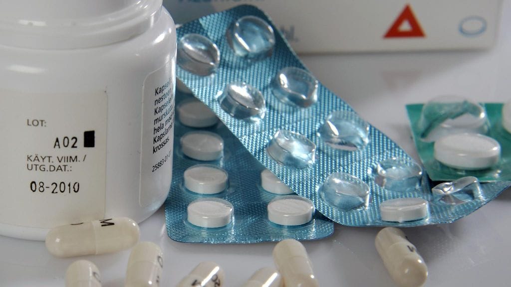 Lääkkeitä kuvituskuvassa.