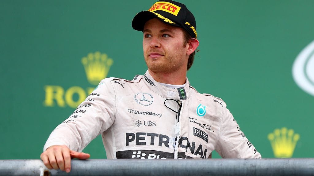 Nico Rosberg pettyneenä podiumilla Austinin kisan jälkeen.