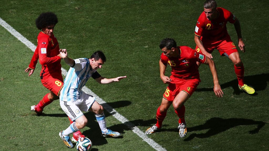 Belgia jahtasi Lionel Messiä MM-kisoissa 2014.