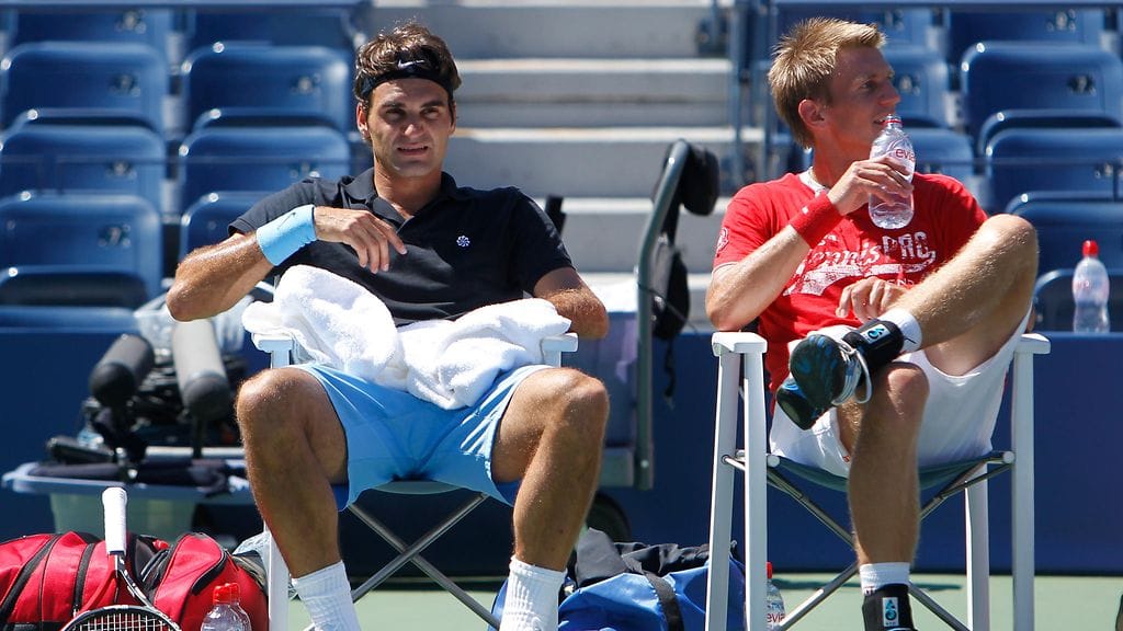 Roger Federer ja Jarkko Nieminen harjoituksissa US Openissa vuonna 2010.