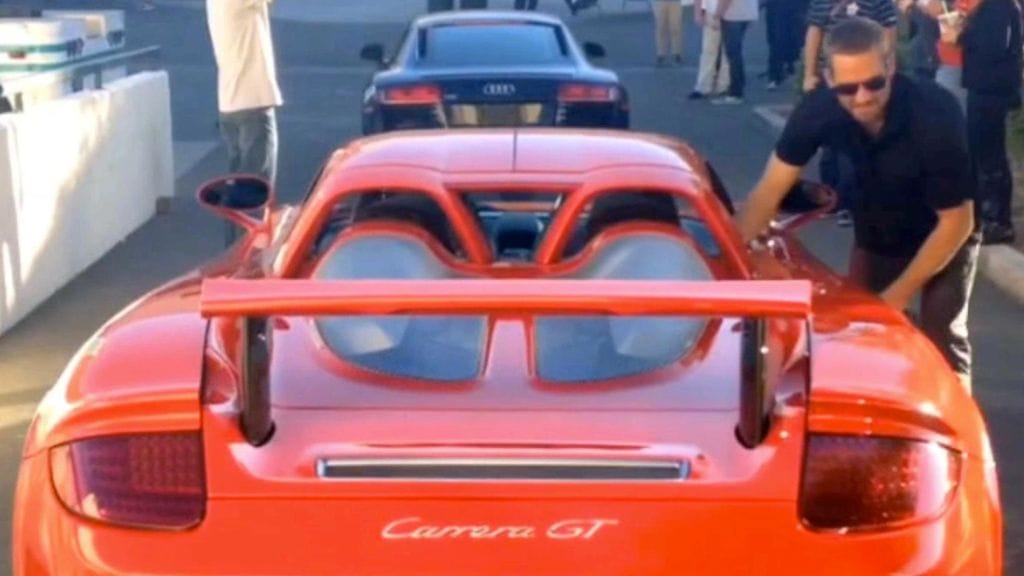 Paul Walker with the Porsche Carrera GY that he was killed in when it crashed and burst into flames.