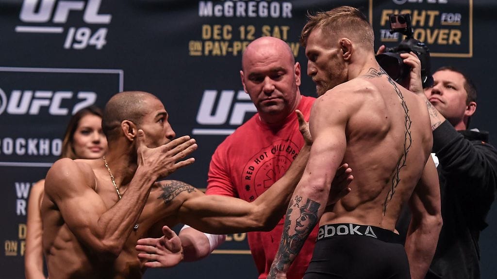 Jose Aldo (vas,) ja Conor McGregor ottavat lauantaina yhteen odotetussa ottelussa.