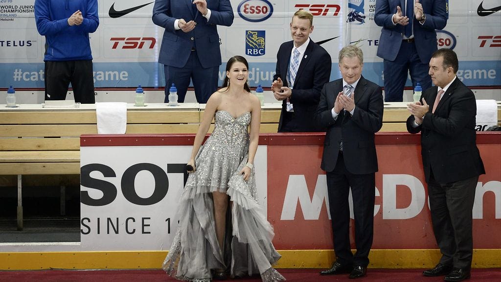 Saara Aalto ja Sauli Niinistö jääkiekko-ottelussa 26. joulukuuta 2015. Molemmat kannustavat Leijonia myös MM-finaalissa.