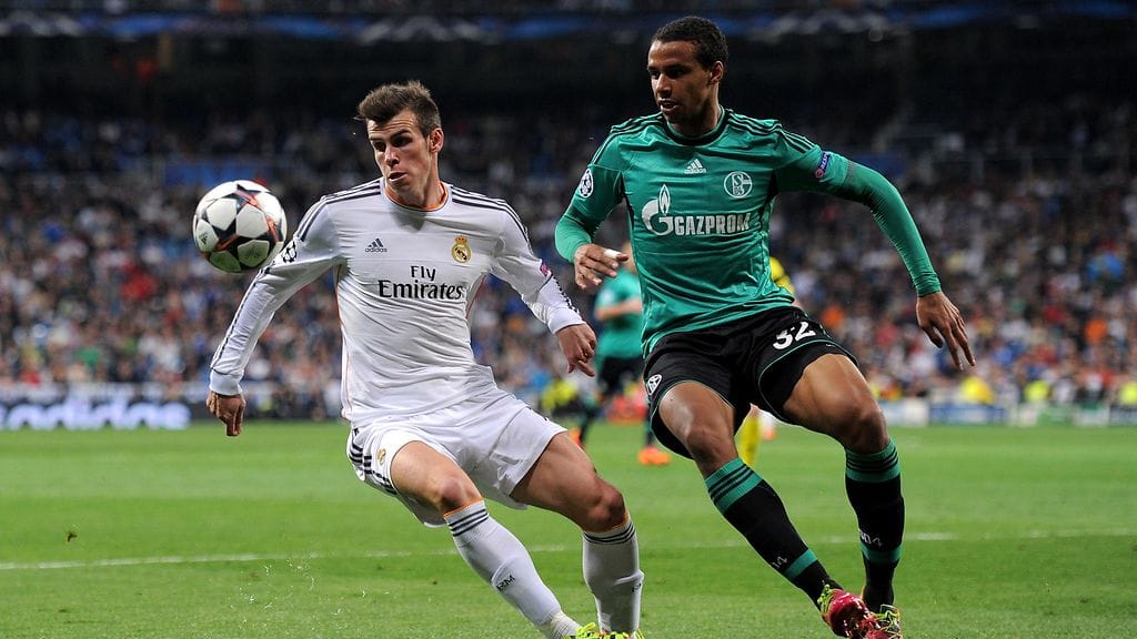 Joel Matip (oik.) paimensi Real Madridin Gareth Balea Mestarien liigassa maaliskuussa 2014.