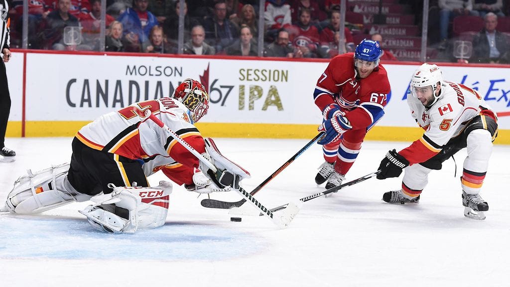 Niklas Bäckström torjui 21 laukausta ensimmäisessä Flames-ottelussaan.