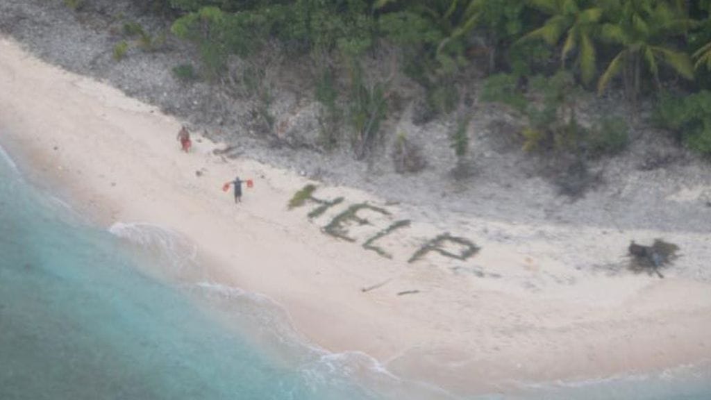 Autiolle saarelle haaksirikkoutuneiden miesten viesti havaittiin merivoimien lentokoneesta. Kuva: US Coast Guard Hawaii Pacific/Facebook