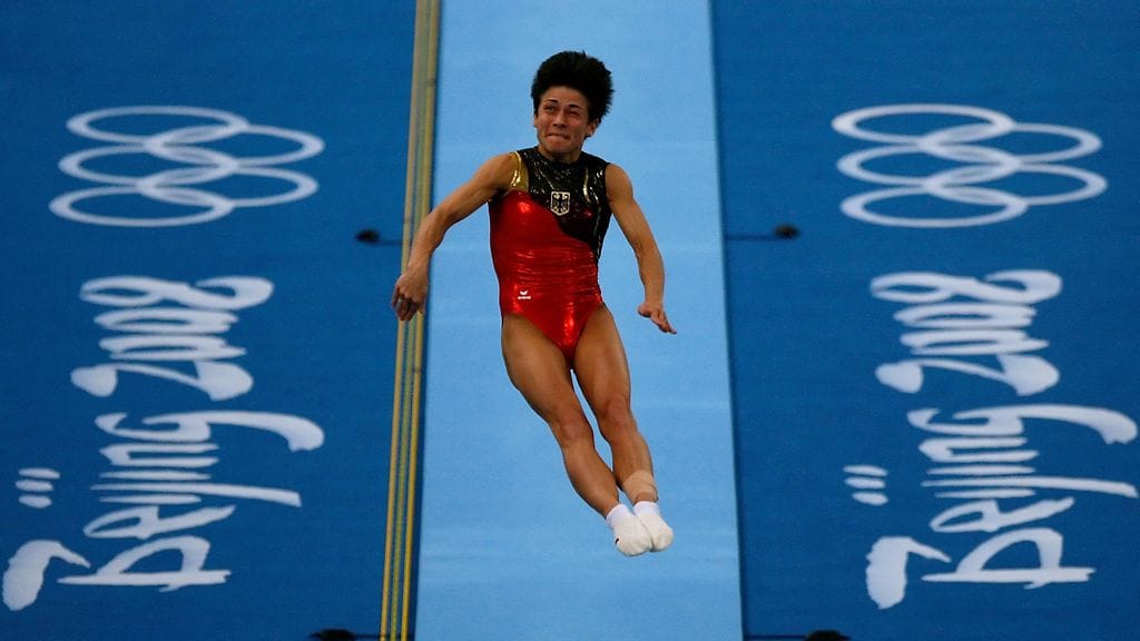 Pekingin olympiakisoissa Oksana Tshusovitina edusti Saksaa.